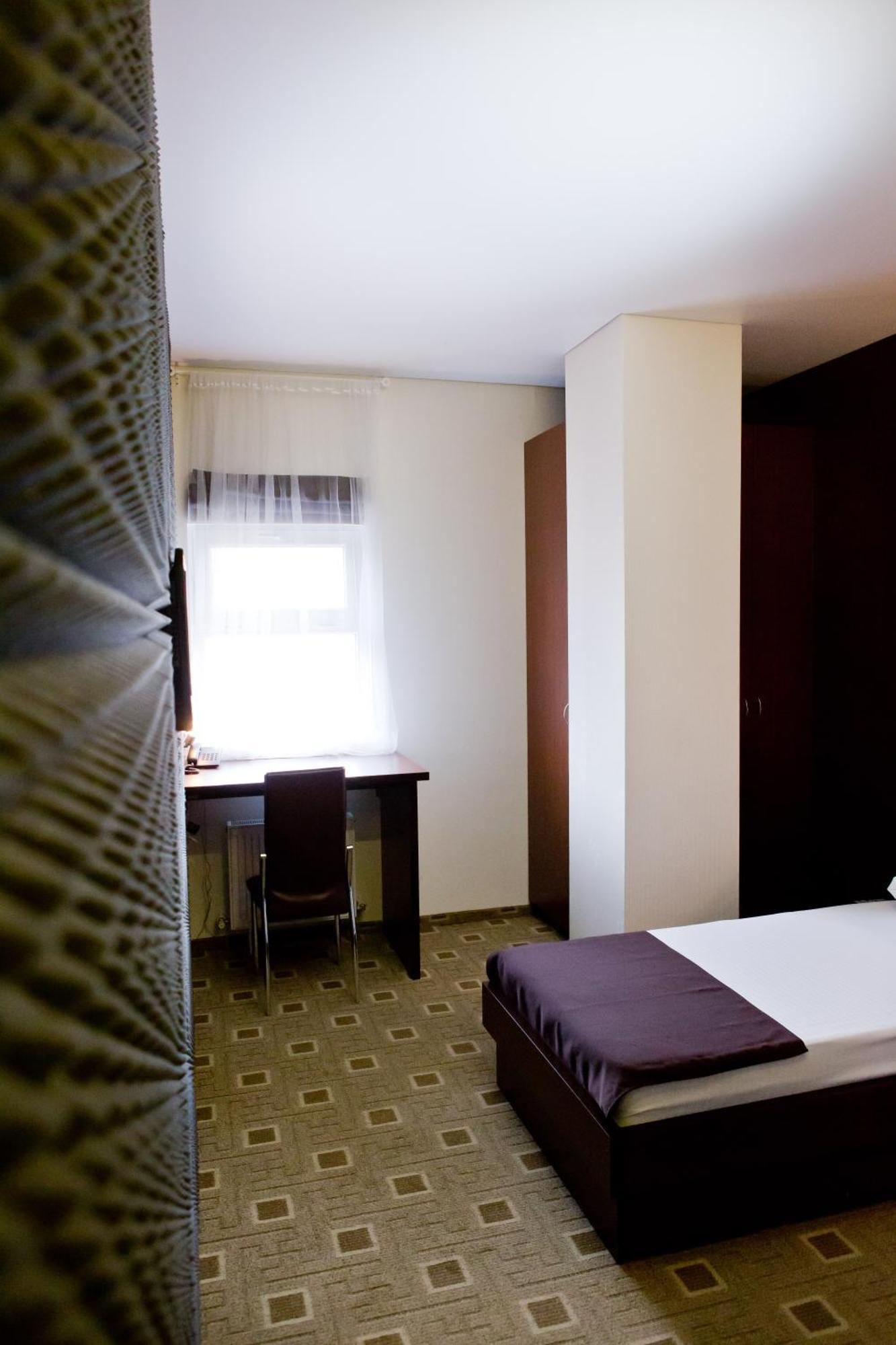 Hotel Olsi Chisináu Habitación foto